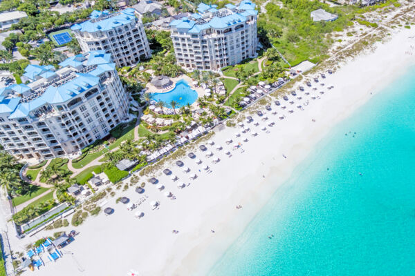 Overhead view of the pool, beach, and landscaping at Seven Stars