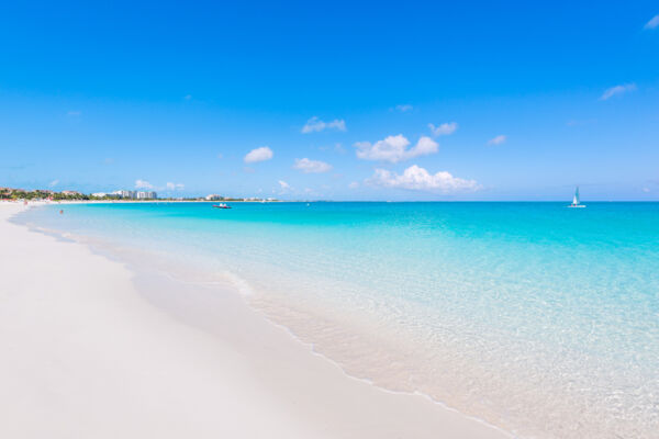 Calm ocean and white sand at Grace Bay Beach