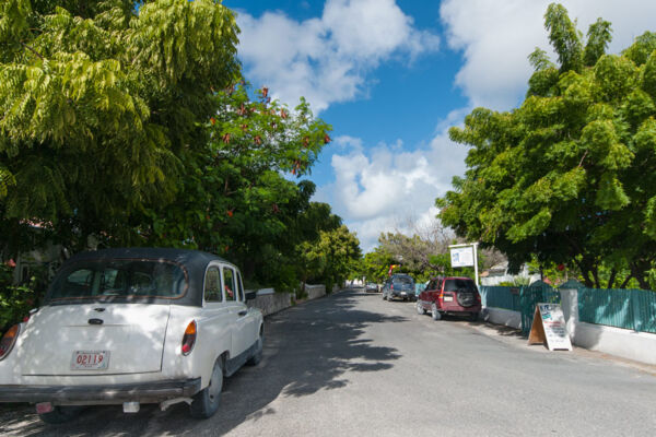 Vintage car on the narrow streets of Cockburn Town on Grand Turk