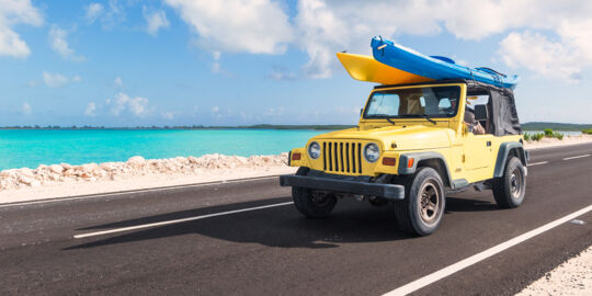 Jeep Wrangler with kayaks on the North Caicos and Middle Caicos Causeway