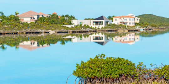 Calm water and luxury villas at Silly Creek in the Turks and Caicos