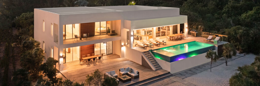 Aerial view of luxury villa in the Turks and Caicos at dusk