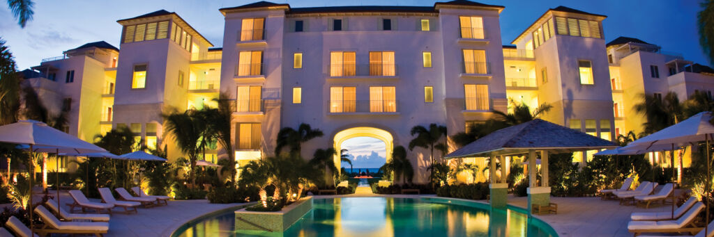 The pool at West Bay Club at dusk