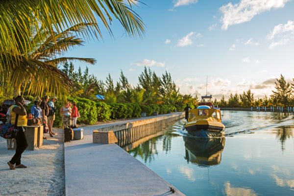 Passenger ferry boat arriving at Sand Point Marina on North Caicos in the Turks and Caicos Islands