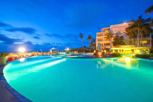 Pool and restaurant at The Palms