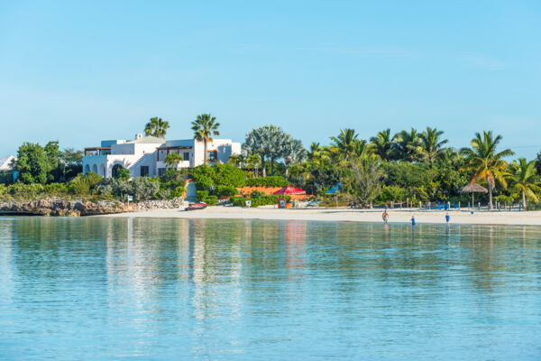 Sapodilla Bay Beach and luxury villas in the morning