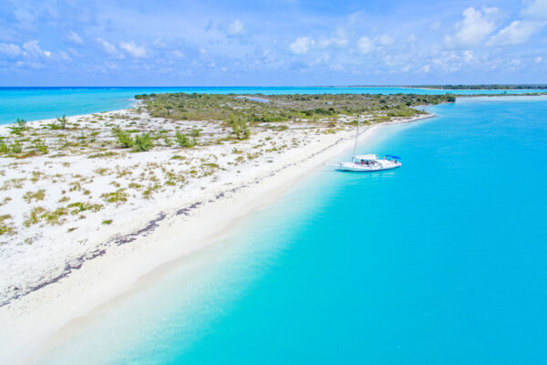 Tour sailboat at the beach at Fort George Cay in the Turks and Caicos