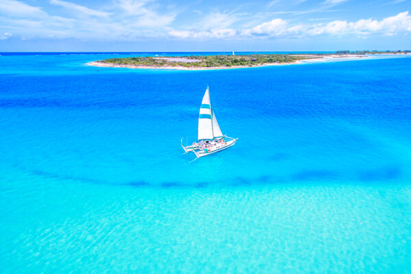 Catamaran excursion boat sailing in the blue waters of the Turks and Caicos