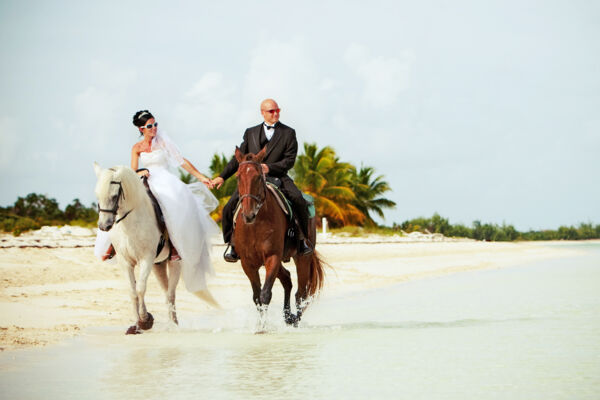 Turks and Caicos wedding photo shoot on horseback at Long Bay Beach